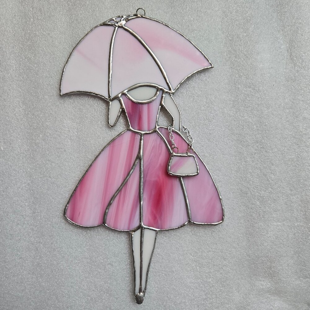Lady with parasol and purse stained glass